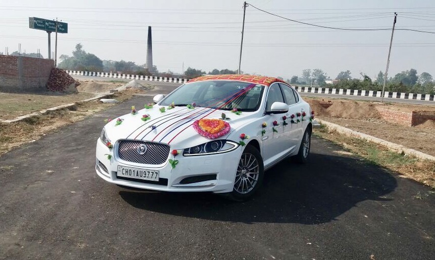JAGUAR XF WHITE wedding car hire Punjab — Punjab Wedding Cars