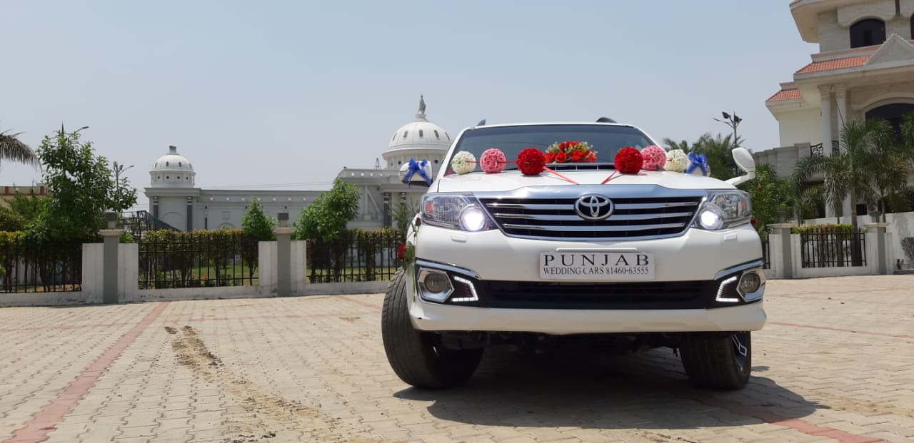 TOYOTA Fortuner White wedding car hire Punjab — Punjab Wedding Cars